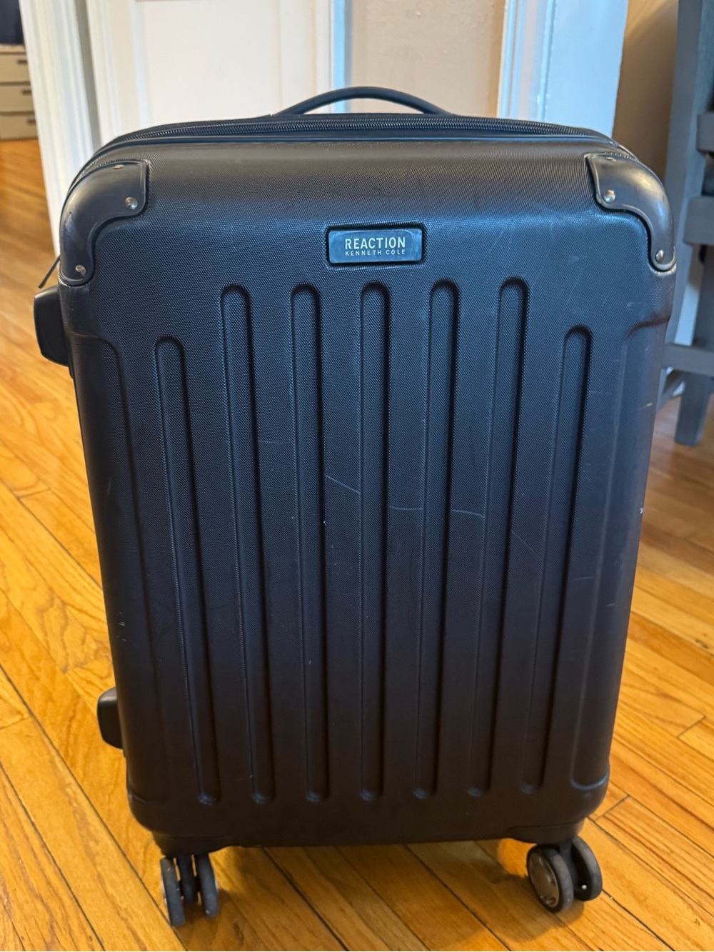 Kenneth Cole Reaction Lightweight Hardside Expandable Spinner Luggage 24”